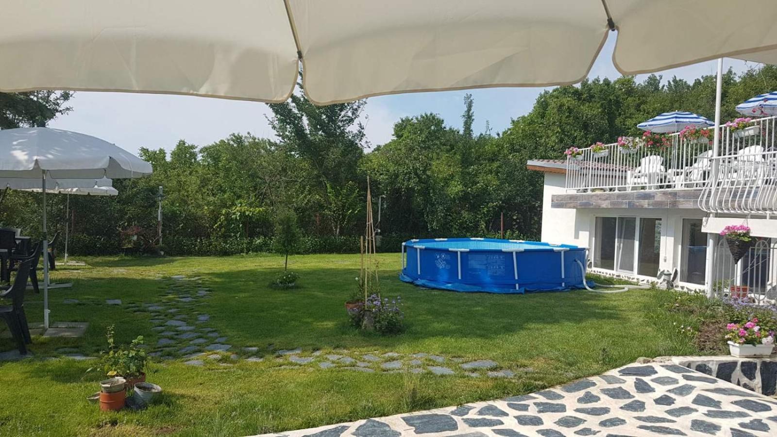 Simada Blue Guesthouse โกลเดน แซนส์ ภายนอก รูปภาพ
